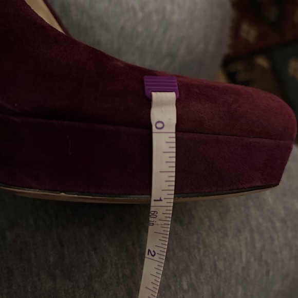 Michael Kors Burgundy platform pump’s  are 1 inch platform just around 4 inches - Picture 13 of 14